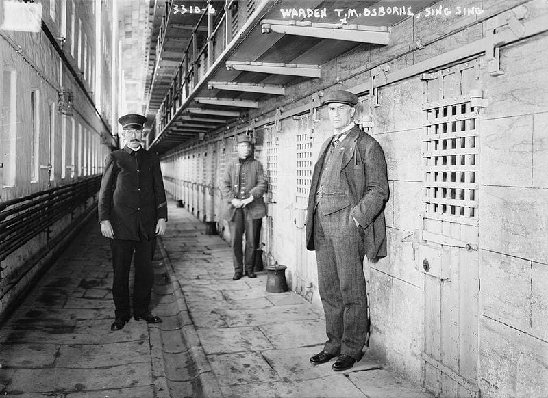 Gregarious Troglodyte prison picture black and white with guards and warden