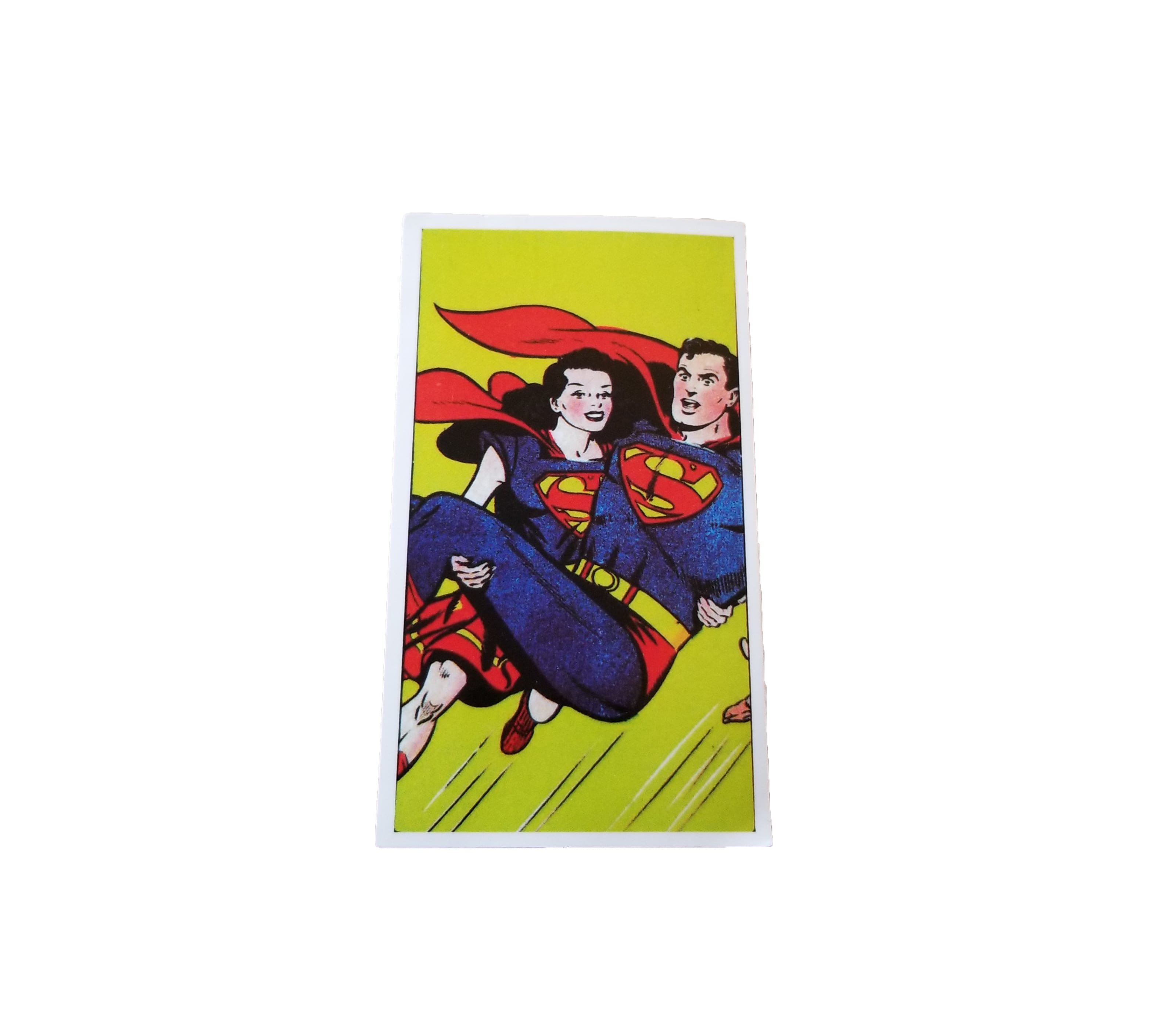 a rare sticker of wonder woman carrying superman